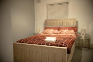 Krevet ili kreveti u jedinici u okviru objekta Very Cosy Home near Westfield, Stratford