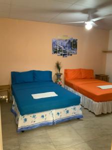 Ένα ή περισσότερα κρεβάτια σε δωμάτιο στο LA DOLCE VITA FRANCOPHONE