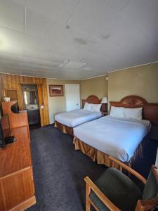 Postel nebo postele na pokoji v ubytování Redrock Country Inn