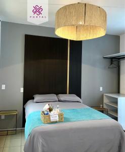 Postel nebo postele na pokoji v ubytování Hotel Portal & Suites