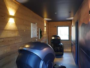 Posedenie v ubytovaní Lodge PMR avec jacuzzi privatif, accès spa et activités au bord du golf! - FR-1-582-372
