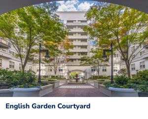 an image of an english garden courtyard in front of a building at Spacious 2 Bed, 2 Bath Uptown Gem in the Heart of the City-Parking-Wi-Fi in Charlotte