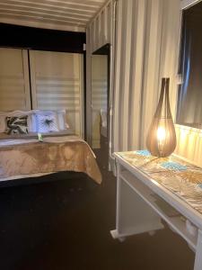 Posteľ alebo postele v izbe v ubytovaní Recanto Monte Trigo casa Container