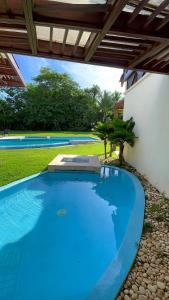 Bazén v ubytování SrvittiniVillas Spacius Confort Villa Fam Team CouplesCasa de Campo Resort nebo v jeho okolí