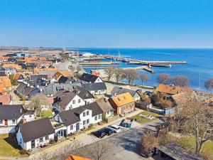 an aerial view of a small town next to the ocean at Holiday home SKILLINGE II in Skillinge