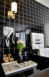 Kuchyň nebo kuchyňský kout v ubytování Hotel Del Luna Boutique