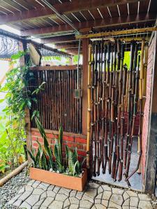 a bunch of bats hanging on a fence at Eco Glamping Cordillera in Buenavista