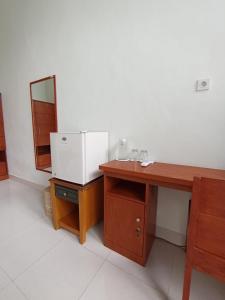 Køkken eller tekøkken på RaCottage Mandalika