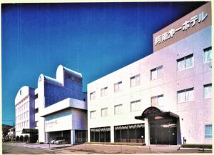 a large building with a sign on the side of it at Anan Daiichi Hotel - Vacation STAY 55570v in Anan