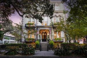 a large white building with a front door at Hamilton Turner Inn in Savannah