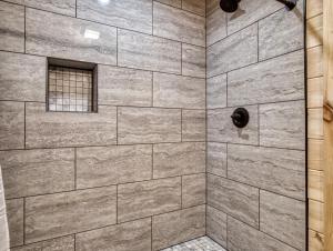 A bathroom at Jolly Jingle Cabin, Pickleball Court, Creek, WIFI, Mountain Views, Starting at 79"