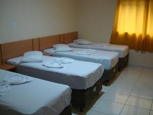 Krevet ili kreveti u jedinici u okviru objekta Santa Catarina Hotel