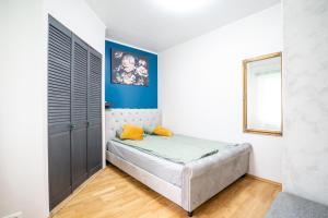 Кровать или кровати в номере Pärnu Pärl apartment