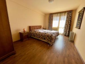 Ένα ή περισσότερα κρεβάτια σε δωμάτιο στο Private Apartments next to Bellevue Residence