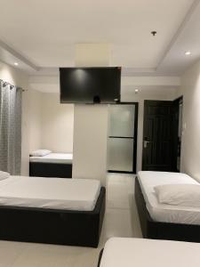 Letto o letti in una camera di Central Block Inn