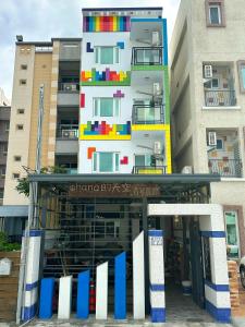 a building with a building with blocks on it at Taitung Ohana Sky Hostel in Taitung City