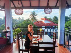 Balkón nebo terasa v ubytování Ayubowan Homestay Katunayake