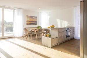 Η κουζίνα ή μικρή κουζίνα στο Schwalbennest 1-3 +29 φωτογραφίες