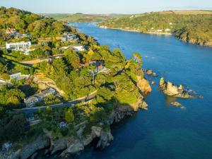 an aerial view of a town on the edge of a river at Quay Cottage in Salcombe