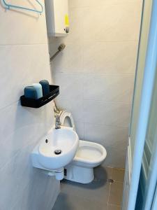 Koupelna v ubytování 嘉應賓館HAKKAS GUEST House