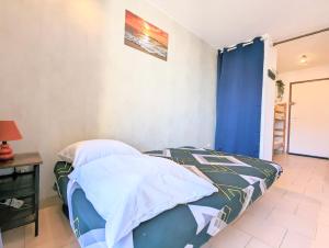 Posteľ alebo postele v izbe v ubytovaní Appartement au CALME + parking
