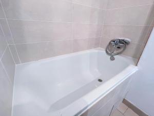 Kúpeľňa v ubytovaní Appartement au CALME + parking