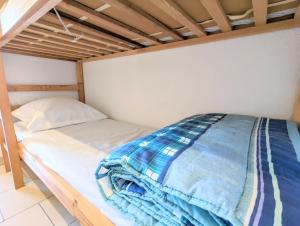 Posteľ alebo postele v izbe v ubytovaní Appartement au CALME + parking