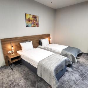 Ένα ή περισσότερα κρεβάτια σε δωμάτιο στο Hotel Centrum +29 φωτογραφίες