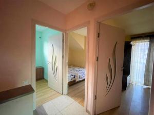 a room with a bedroom with a bed in it at Holiday Home 36 in Tsaghkadzor