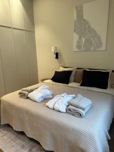 Postel nebo postele na pokoji v ubytování Luxurious Vallikraavi apartment with Sauna, free parking