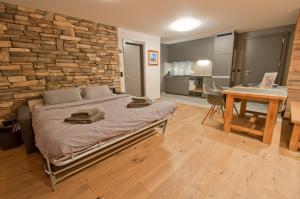 Postel nebo postele na pokoji v ubytování Z Suite Zermatt + 12 fotografií