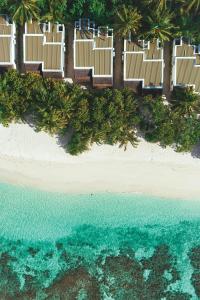 an aerial view of the beach and the ocean at OBLU NATURE Helengeli-All-Inclusive with free Transfers in North Male Atoll