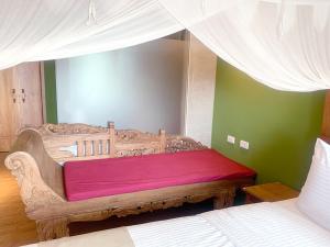 Letto o letti in una camera di Wanzai B&B