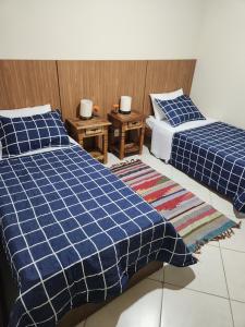 Кровать или кровати в номере Hospedagem Vanilda