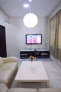 A television and/or entertainment centre at Bungalow with Private pool at Kajang Sg Chua