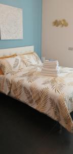 Postel nebo postele na pokoji v ubytování Bloom Apartment