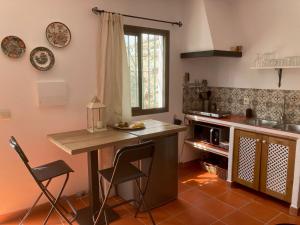 Η κουζίνα ή μικρή κουζίνα στο Casita La Pura Vida Yunquera