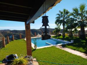 a view of a pool from a house at Paraje El Pozo in Málaga +56 photos