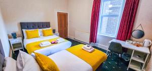 Ένα ή περισσότερα κρεβάτια σε δωμάτιο στο mySTAYINN Abermar Guest House