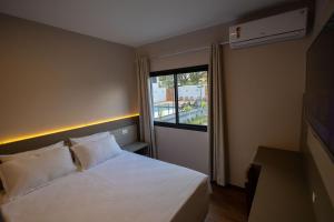 Postel nebo postele na pokoji v ubytování Safa Hotel Foz + 26 fotografií
