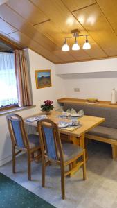 Posedenie v ubytovaní Gästehaus Christl + 8 fotografií