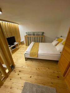 Postel nebo postele na pokoji v ubytování Bocskai Apartman