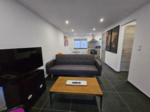 Küche/Küchenzeile in der Unterkunft Appart'Hôtel Trazegnies