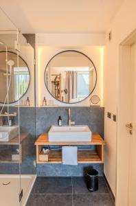 Koupelna v ubytování Aparthotel Parsberg GreenDesign + 37 fotografií