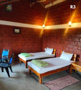 Postel nebo postele na pokoji v ubytování Chalobahills Farmstay Resort