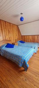 Postel nebo postele na pokoji v ubytování cabaña