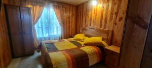 Postel nebo postele na pokoji v ubytování cabaña