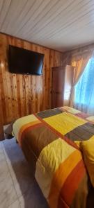 Postel nebo postele na pokoji v ubytování cabaña