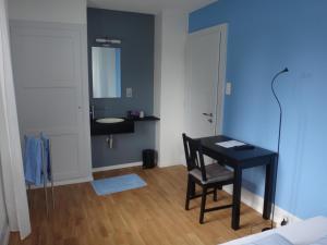 Postel nebo postele na pokoji v ubytování BnB Hopfengrün Langenthal