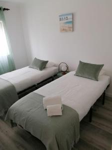 Ένα ή περισσότερα κρεβάτια σε δωμάτιο στο Baleal Atlantic 6